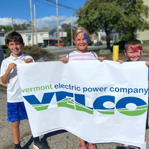 Children holding VELCO banner