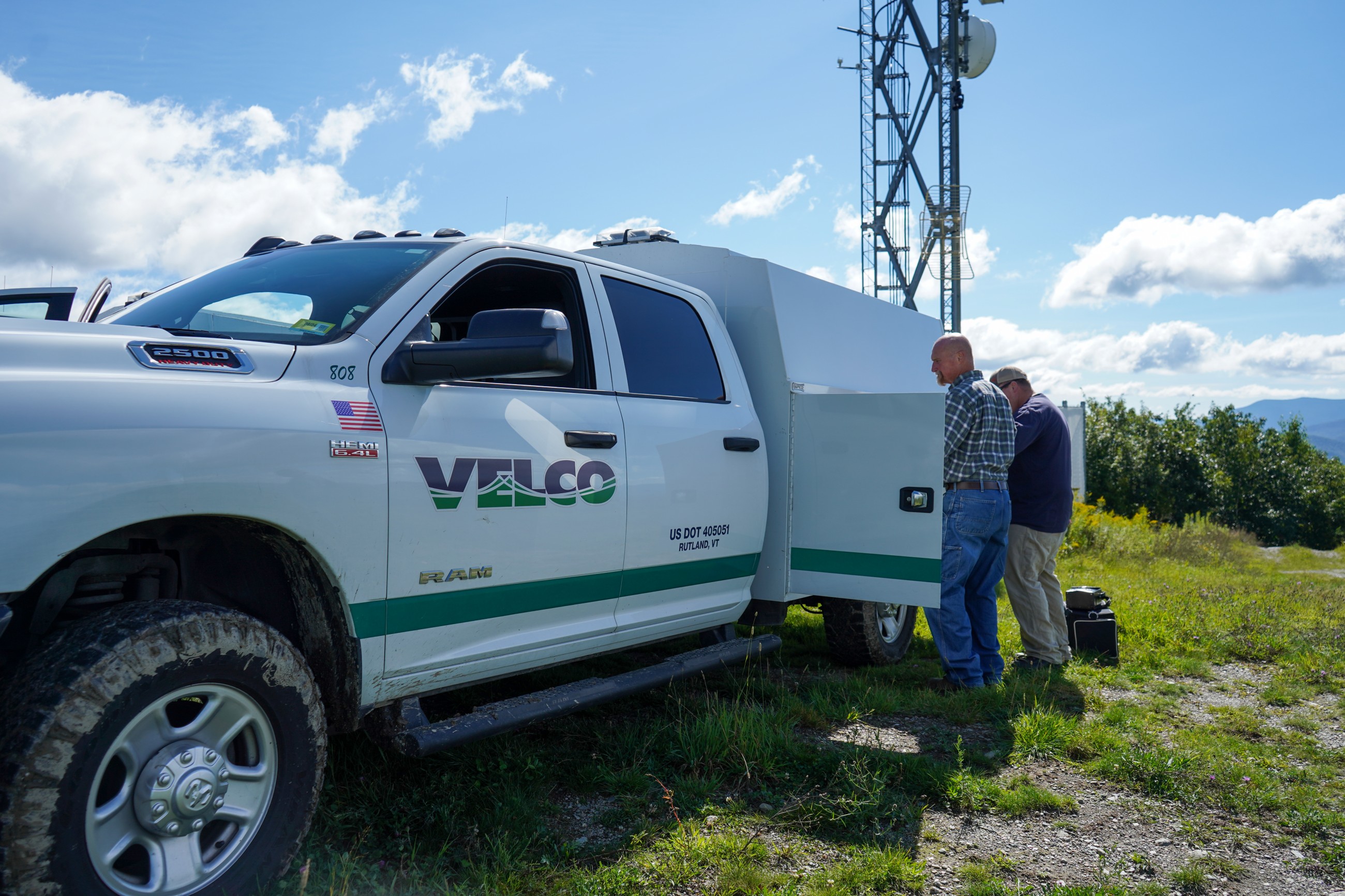 Velco workers with service truck